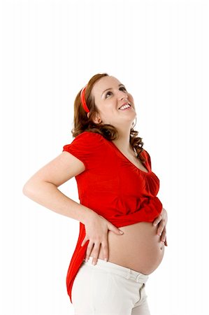 simsearch:400-04859723,k - Beautiful pregnant woman on white enjoying this wonderful moment Fotografie stock - Microstock e Abbonamento, Codice: 400-04066108