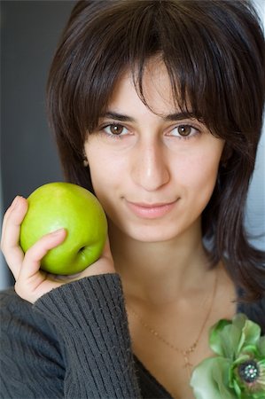 eastern european cuisine - Portrait of girl with green apple Stock Photo - Budget Royalty-Free & Subscription, Code: 400-04067785