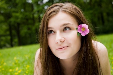 simsearch:400-04399399,k - Happy Young Woman Laying On Grass Foto de stock - Super Valor sin royalties y Suscripción, Código: 400-04068112