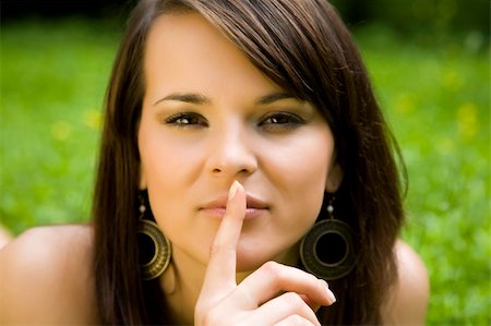 simsearch:400-04622088,k - Silence. Beautiful Woman On Natural Background. Stock Photo - Budget Royalty-Free & Subscription, Code: 400-04068248