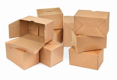 simsearch:700-02637506,k - close-up of three cardboard boxes againt white background Photographie de stock - Aubaine LD & Abonnement, Code: 400-04068293