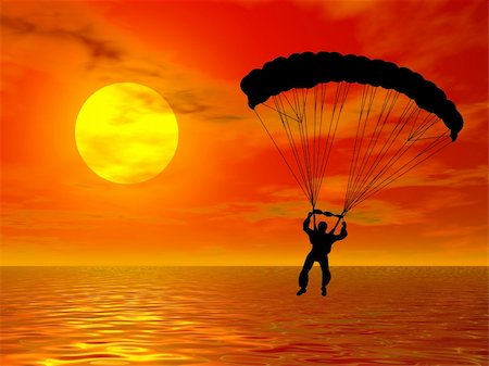 Parachutist in silhouette against a colorful sunset Stock Photo - Budget Royalty-Free & Subscription, Code: 400-04068471