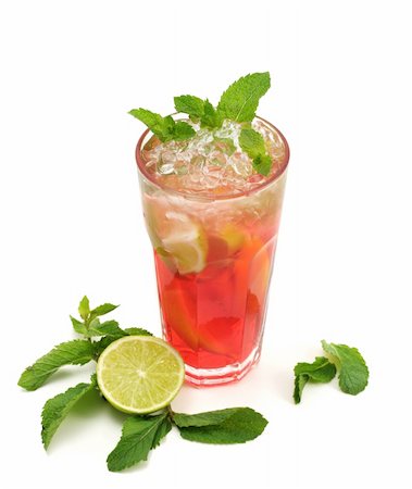 Refreshment Soft Drink made of Black Tea, Orange, Grenadine Syrup, Lime and Mint. Isolated on White Background. Stock Photo - Budget Royalty-Free & Subscription, Code: 400-04068817