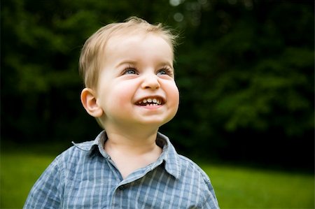 simsearch:400-04001701,k - Happy Little Boy Relaxing Outdoors Stock Photo - Budget Royalty-Free & Subscription, Code: 400-04069316