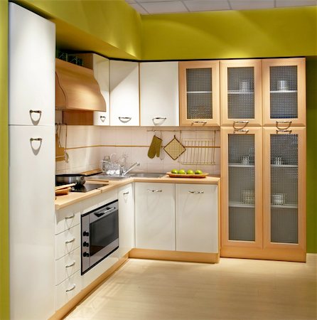 simsearch:659-06373243,k - Modern wooden kitchen counter with big cabinet Foto de stock - Super Valor sin royalties y Suscripción, Código: 400-04069530