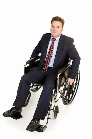 simsearch:400-05021851,k - Disabled businessman in wheelchair with a serious expression.  Full body isolated on white. Foto de stock - Super Valor sin royalties y Suscripción, Código: 400-04069547