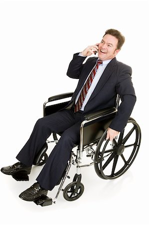 simsearch:400-05021851,k - Disabled businessman in wheelchair talking on his cellphone.  Full body isolated on white. Foto de stock - Super Valor sin royalties y Suscripción, Código: 400-04069548