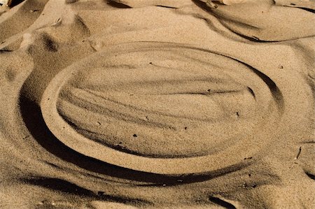 sandbox - Cirlce in beige beach sand. Summer vacation background with lots of copy space. Stock Photo - Budget Royalty-Free & Subscription, Code: 400-04069861