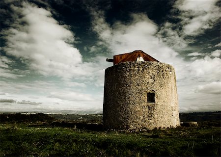 Landscape picture with an old vintage windmill - Colors adjusted in PS Stock Photo - Budget Royalty-Free & Subscription, Code: 400-04060084