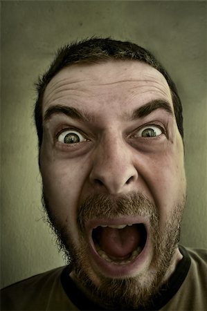 dundanim (artist) - Screaming loud - Absolutely shocked and outraged guy Fotografie stock - Microstock e Abbonamento, Codice: 400-04060228