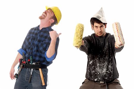 construction worker tittering and house painter in style cow-boy with paint roller Stock Photo - Budget Royalty-Free & Subscription, Code: 400-04060339