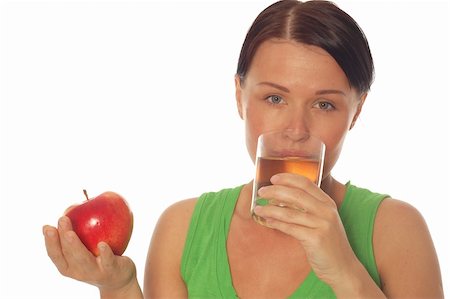 simsearch:400-04564926,k - attractive woman with apple and juice on white background Photographie de stock - Aubaine LD & Abonnement, Code: 400-04060411
