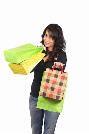 simsearch:400-05278482,k - A woman holding several shopping bags, isolated on white background Foto de stock - Royalty-Free Super Valor e Assinatura, Número: 400-04060666