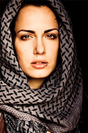 Arab woman using veil with her mouth pierced. Stock Photo - Budget Royalty-Free & Subscription, Code: 400-04060756