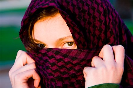 face covered with scarf - Staring woman portrait covered by violet veil Stock Photo - Budget Royalty-Free & Subscription, Code: 400-04060751