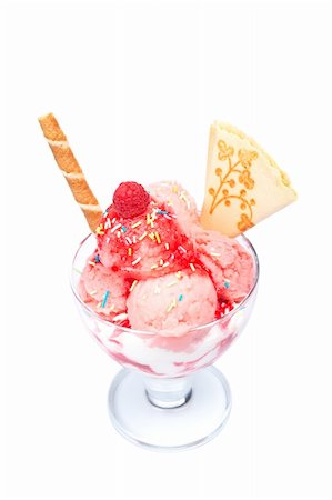 simsearch:400-05314685,k - Delicious strawberry ice cream in glass bowl isolated on white background. Shallow DOF Stock Photo - Budget Royalty-Free & Subscription, Code: 400-04060941