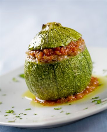 round zuccini stuffed with mince,rice and tomato sauce, baked in the oven Stock Photo - Budget Royalty-Free & Subscription, Code: 400-04061215