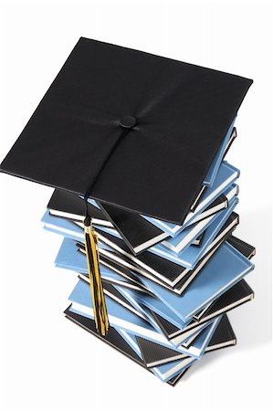 simsearch:400-05254227,k - graduation cap and books on white background Photographie de stock - Aubaine LD & Abonnement, Code: 400-04061327
