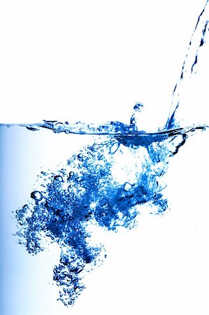 simsearch:400-04530350,k - A background of water pouring and making bubbles Stockbilder - Microstock & Abonnement, Bildnummer: 400-04061368