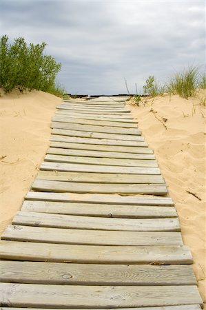 wooden path leading to the edge of a cliff Foto de stock - Royalty-Free Super Valor e Assinatura, Número: 400-04061479