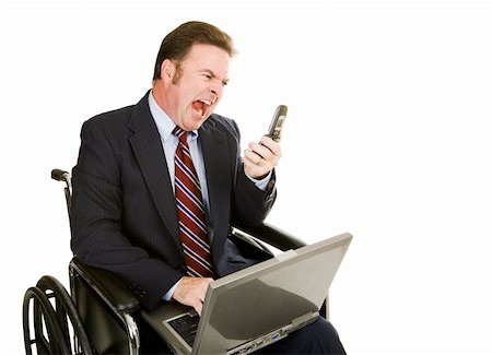 Disabled businessman in wheelchair yelling into his cellphone.  Isolated on white Stock Photo - Budget Royalty-Free & Subscription, Code: 400-04061573