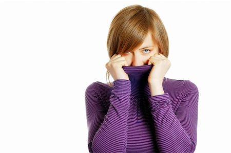 attractive young woman hiding in the turtleneck Stock Photo - Budget Royalty-Free & Subscription, Code: 400-04061690