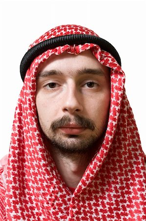 simsearch:693-06019317,k - Portrait of an arabian young man in traditional headscarf - shemagh. Foto de stock - Royalty-Free Super Valor e Assinatura, Número: 400-04061774