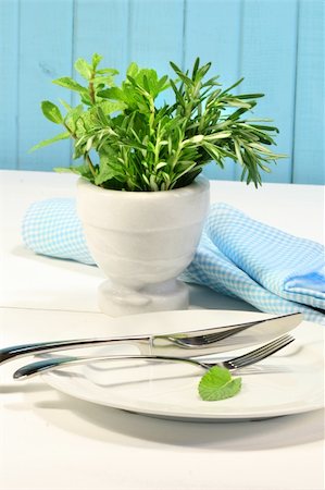 rosemary sprig - Fresh green herbs on a table in the kitchen Stock Photo - Budget Royalty-Free & Subscription, Code: 400-04062145