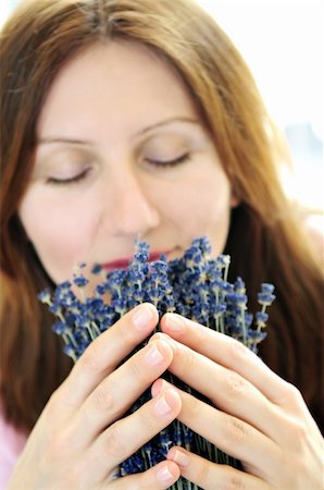 simsearch:400-05947571,k - Mature woman smelling lavender flowers - focus on hands Stock Photo - Budget Royalty-Free & Subscription, Code: 400-04062432