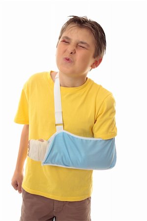 simsearch:400-04562918,k - Boy wincing at painful injuries. Stockbilder - Microstock & Abonnement, Bildnummer: 400-04062495