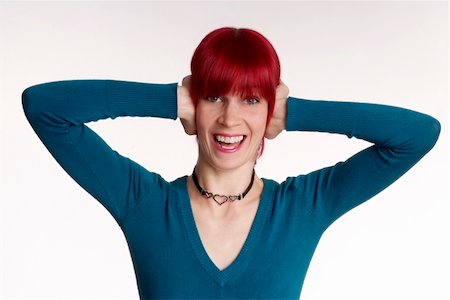 sacrificial - woman with red hair keeps ear closed Stock Photo - Budget Royalty-Free & Subscription, Code: 400-04062559