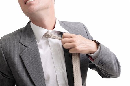 simsearch:400-03926780,k - young stressed businessman unfastening his tie Stockbilder - Microstock & Abonnement, Bildnummer: 400-04062656