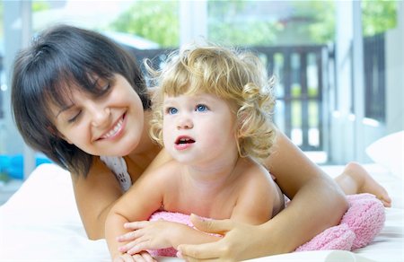 simsearch:400-04535025,k - High key portrait of happy mother with baby Stock Photo - Budget Royalty-Free & Subscription, Code: 400-04062799