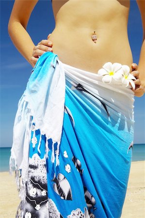 Close-up view of nice woman’s belly in summer environment Stock Photo - Budget Royalty-Free & Subscription, Code: 400-04062802