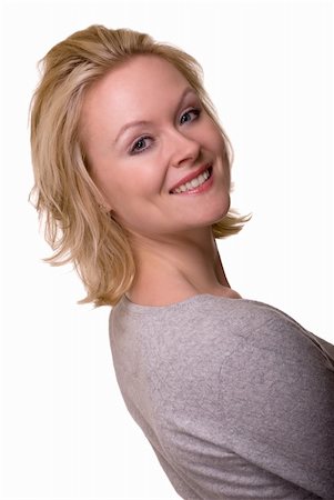 simsearch:400-04498992,k - Portrait of an attractive woman with blond hair and blue eyes with nice smile facial expression wearing a casual grey top over white Photographie de stock - Aubaine LD & Abonnement, Code: 400-04063028
