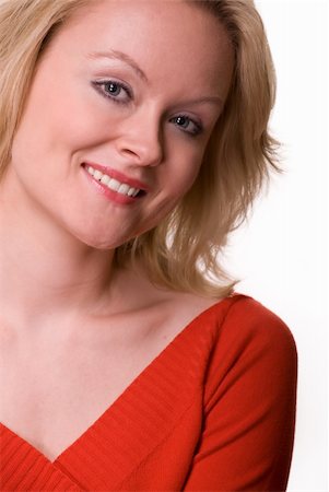 simsearch:400-04498992,k - Portrait of an attractive woman with blond hair and blue eyes with nice smile facial expression over white Photographie de stock - Aubaine LD & Abonnement, Code: 400-04063031