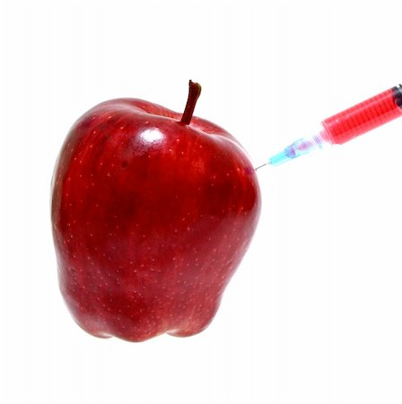syringe on a fresh and juicy red apple Foto de stock - Super Valor sin royalties y Suscripción, Código: 400-04063284