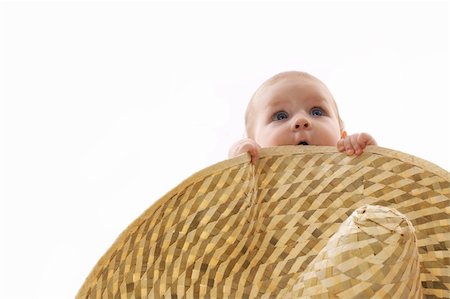 simsearch:400-05041038,k - little baby hidden behind a big hat, portrait, Isolated on white Foto de stock - Super Valor sin royalties y Suscripción, Código: 400-04063407