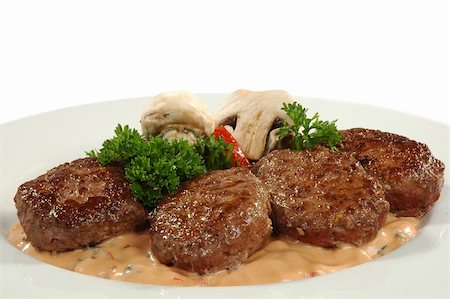 simsearch:400-04822787,k - four cutlets with champignons Stock Photo - Budget Royalty-Free & Subscription, Code: 400-04063742