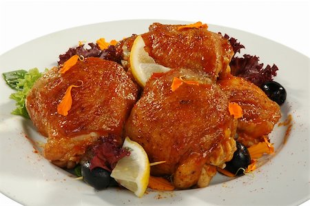 fried chicken thighs with spices on white plate Foto de stock - Super Valor sin royalties y Suscripción, Código: 400-04063754