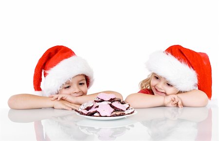 simsearch:400-07088886,k - Happy kids with a plate full of christmas gingerbread cookies - isolated Stock Photo - Budget Royalty-Free & Subscription, Code: 400-04075795