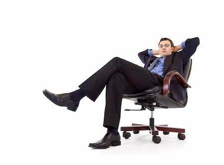 Businessman relaxing in armchair - isolated Foto de stock - Super Valor sin royalties y Suscripción, Código: 400-04075827