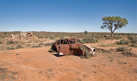 great image of an old car rusting away in the desert Stock Photo - Budget Royalty-Free & Subscription, Code: 400-04076088