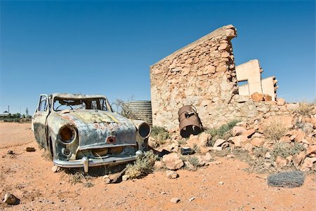 great image of an old car rusting away in the desert Stock Photo - Budget Royalty-Free & Subscription, Code: 400-04076090