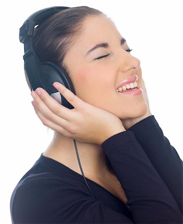 Beautiful young lady is listen to the music, eyes closed Foto de stock - Super Valor sin royalties y Suscripción, Código: 400-04076230