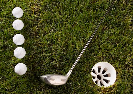 range shooting - Golf ball on tee in grass. Foto de stock - Super Valor sin royalties y Suscripción, Código: 400-04076658