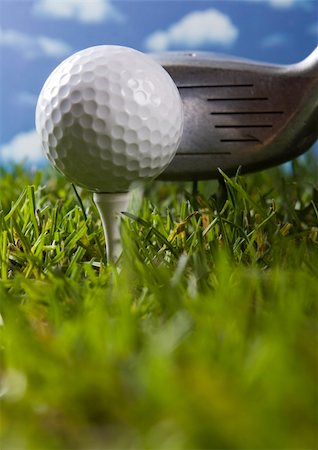 range shooting - Golf ball on tee in grass. Foto de stock - Super Valor sin royalties y Suscripción, Código: 400-04076666