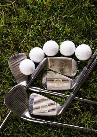 range shooting - Golf ball on tee in grass. Foto de stock - Super Valor sin royalties y Suscripción, Código: 400-04076696
