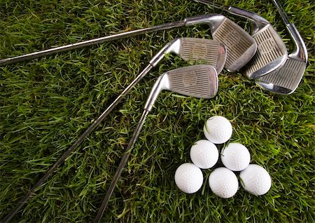 range shooting - Golf ball on tee in grass. Foto de stock - Super Valor sin royalties y Suscripción, Código: 400-04076698