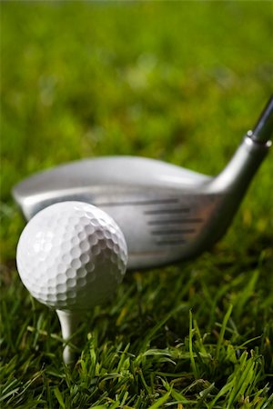 simsearch:400-03975619,k - Golf ball on tee in grass. Stock Photo - Budget Royalty-Free & Subscription, Code: 400-04076745